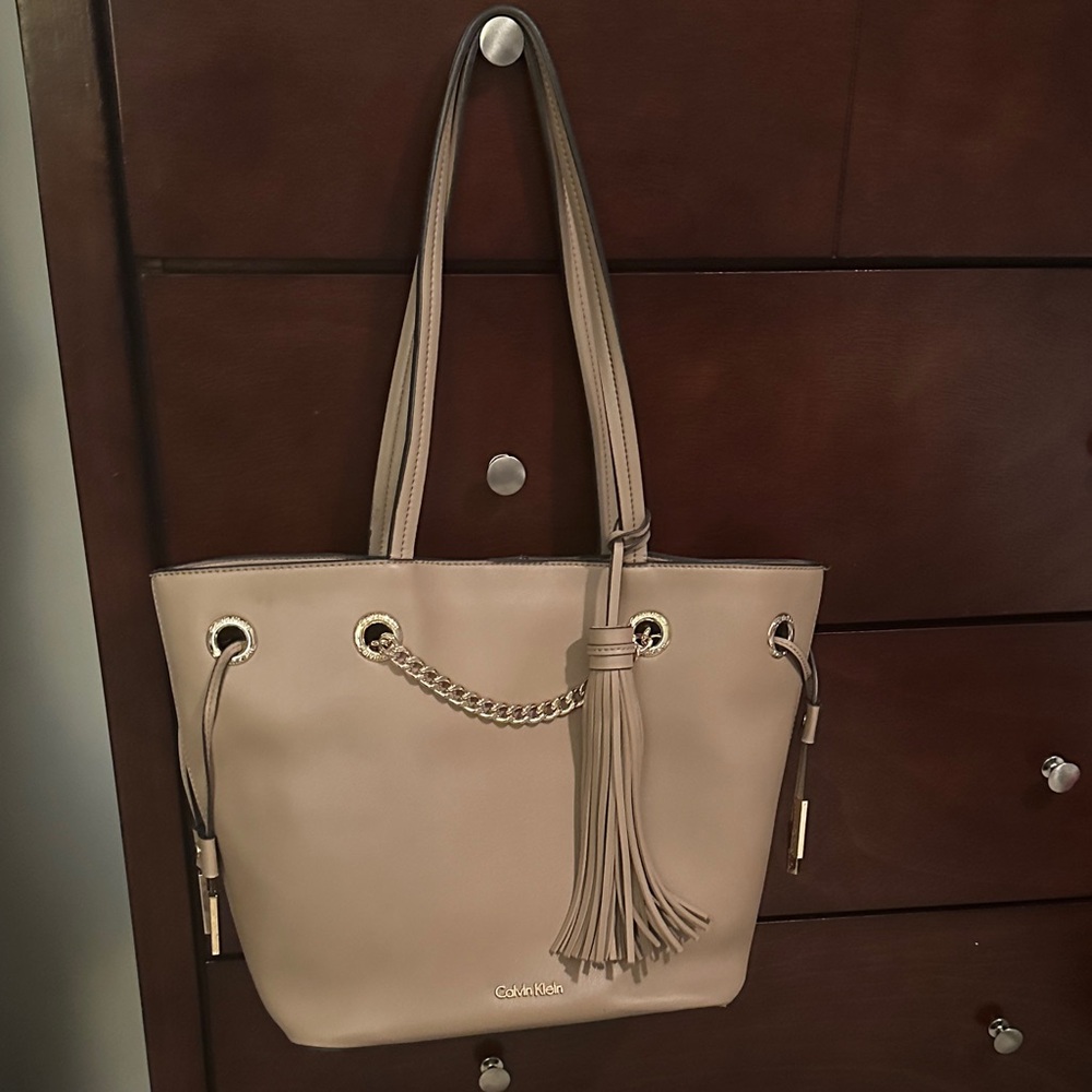Calvin Klein Beige Purse with Tassel Detail